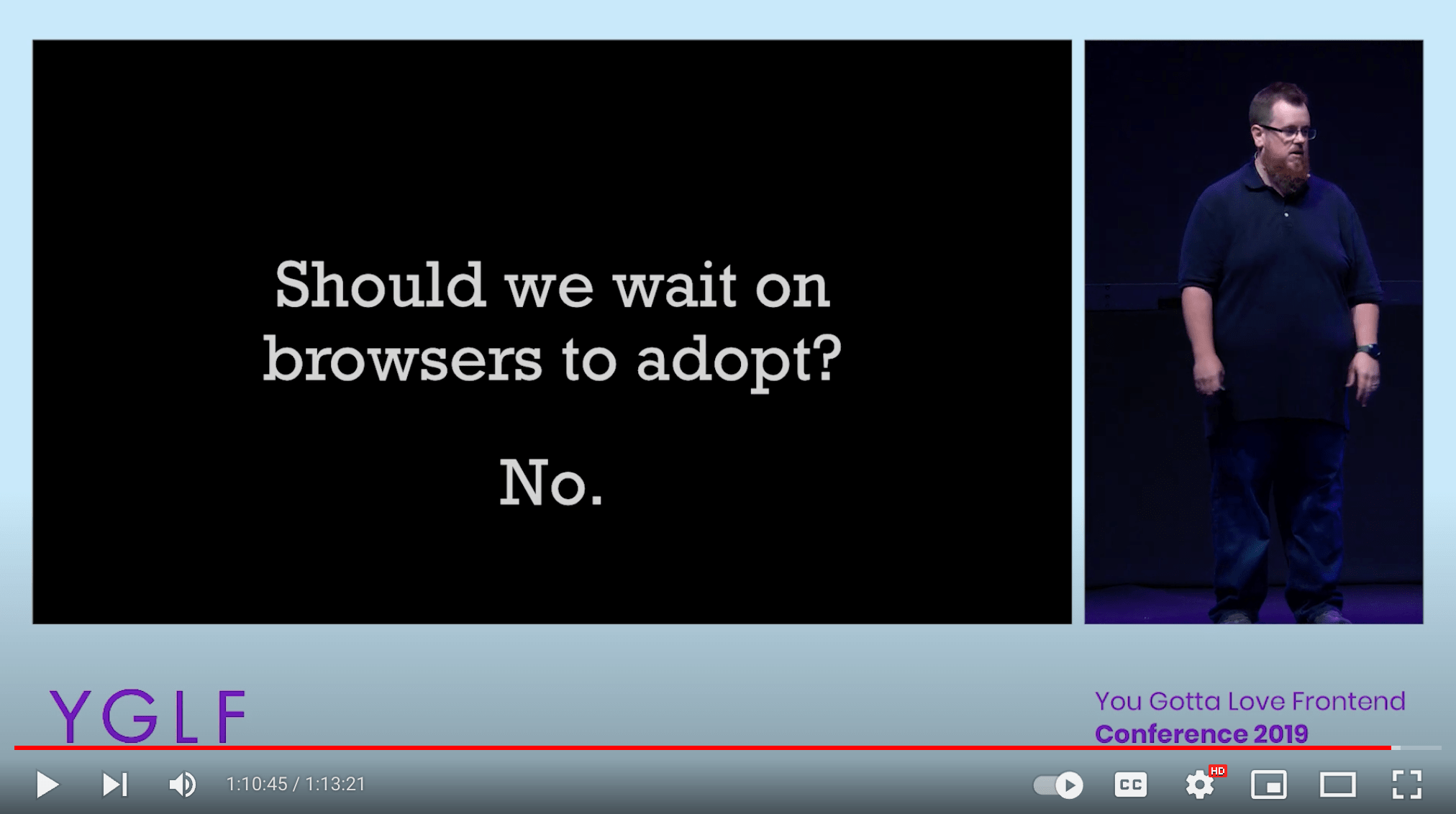 Screenshot from the YGLF conference recording showing Kyle Simpson on stage with a slide saying we shouldn’t wait for browsers to adopt a fidelity in website experiences.