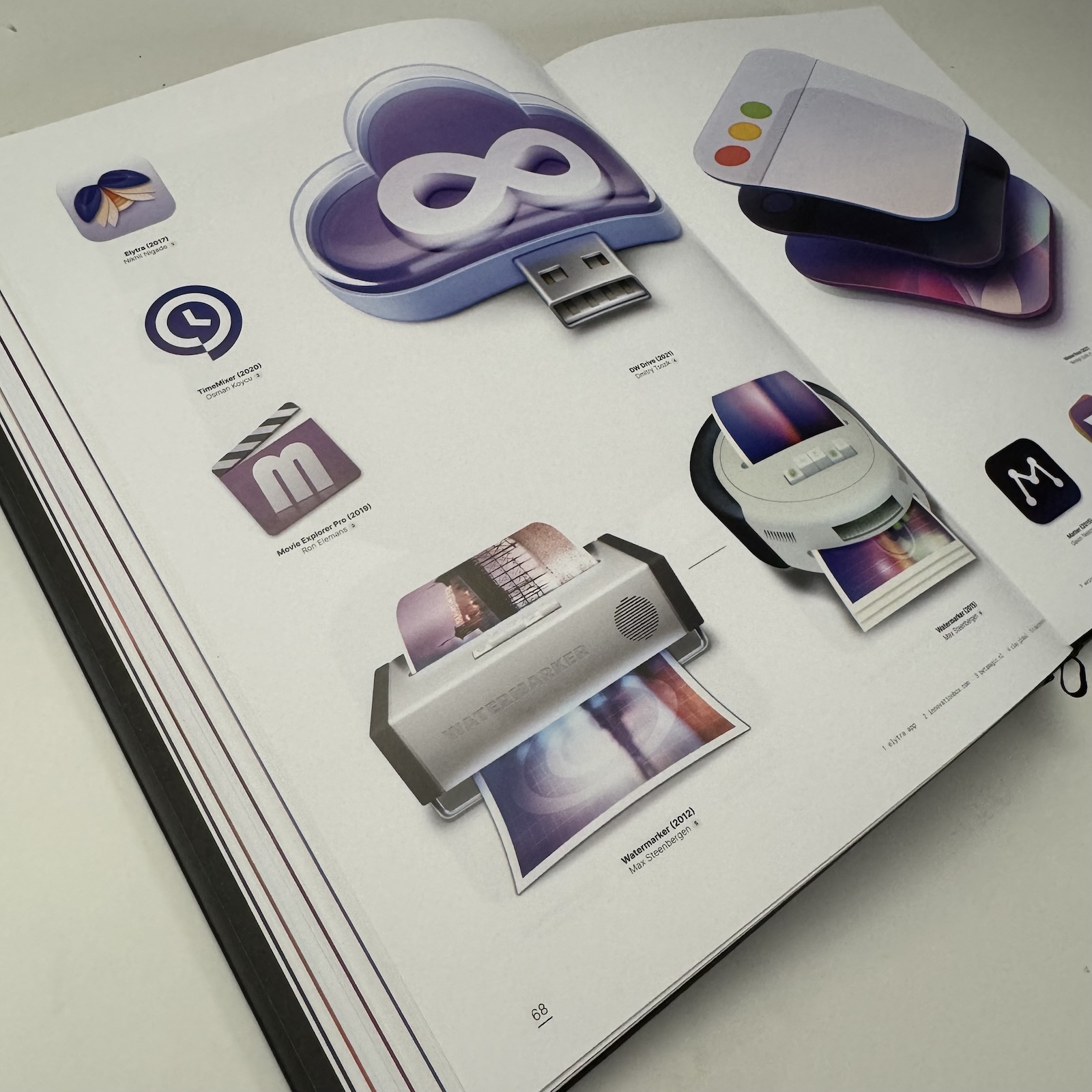 Photograph of the inside of “The macOS App Icon Book” showing a bunch of icons.